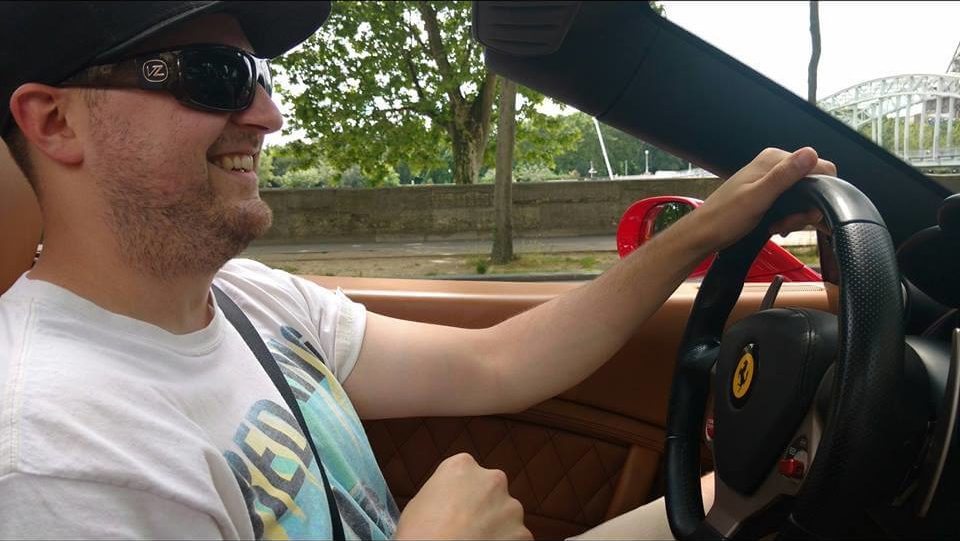 J-D driving a Ferrari in Paris.