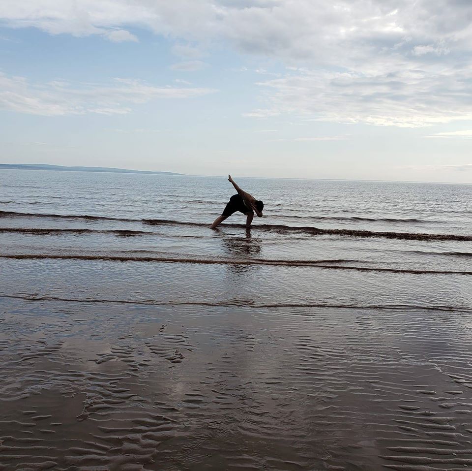 Dovico's Ryan Chitty having fun at the beach.